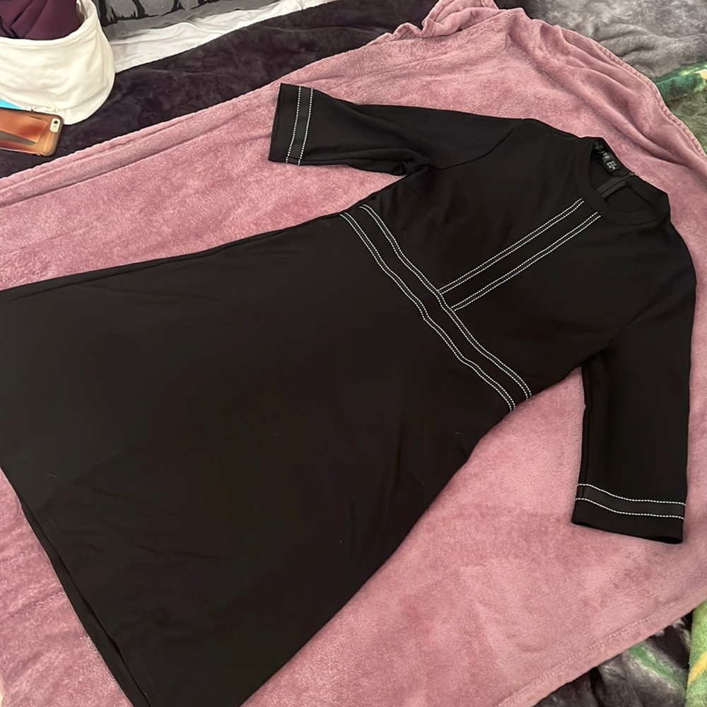Black with white threaded design.